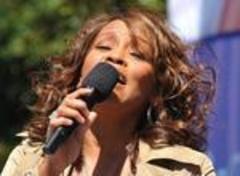 Woman singing Whitney Houston songs escorted off AA flight