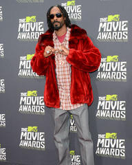 snoop dogg: i can't be a real rastafarian because i love pork too much
