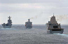 three navy ships return, while another departs for aid mission