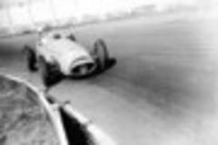 race legend sir stirling enjoys  factory pit-stop